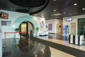 TV a/nebo společenská místnost v ubytování Klana Beach Resort Port Dickson