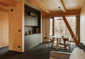 a kitchen and dining room with a table and chairs at Wilcza For Rest in Karpacz