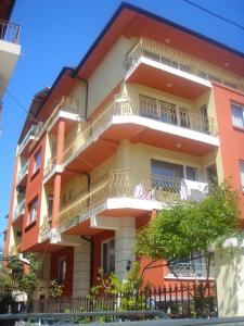 a building with balconies on the side of it at Violeta 7 Guest House in Nesebar