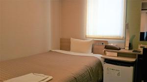Posteľ alebo postele v izbe v ubytovaní Meet Inn Narita