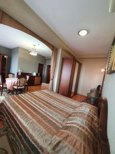 A bed or beds in a room at Turmalin guest rooms