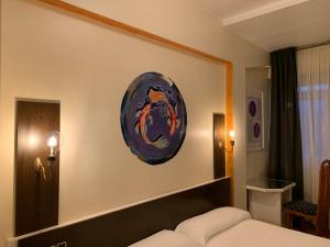 Postel nebo postele na pokoji v ubytování Hotel Brial + 5 fotografií