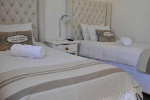 Cama ou camas em um quarto em Timo's guesthouse accommodation