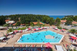 an overhead view of a swimming pool at a resort at Hotel Albatros Plava Laguna in Poreč