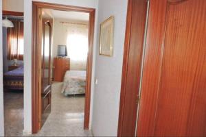 Posteľ alebo postele v izbe v ubytovaní PRECIOSA CASA CON PISCINA AL LADO DE LA PLAYA