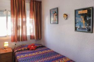 Posteľ alebo postele v izbe v ubytovaní PRECIOSA CASA CON PISCINA AL LADO DE LA PLAYA