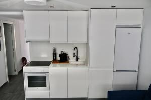 Kuchyň nebo kuchyňský kout v ubytování DreamStay - San Cristobal Playa, Almuñecar