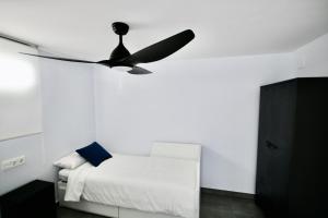 Postel nebo postele na pokoji v ubytování DreamStay - San Cristobal Playa, Almuñecar