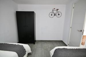 Postel nebo postele na pokoji v ubytování DreamStay - San Cristobal Playa, Almuñecar
