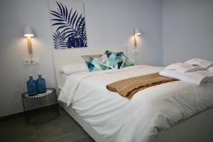 Postel nebo postele na pokoji v ubytování DreamStay - San Cristobal Playa, Almuñecar