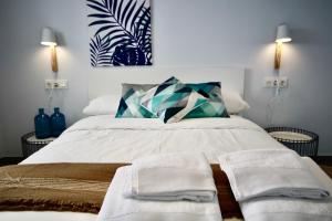 Postel nebo postele na pokoji v ubytování DreamStay - San Cristobal Playa, Almuñecar