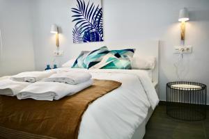 Postel nebo postele na pokoji v ubytování DreamStay - San Cristobal Playa, Almuñecar