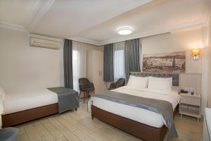 Postel nebo postele na pokoji v ubytování Sim Hotel Istanbul Old City