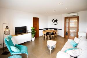 TV a/nebo společenská místnost v ubytování Apartamento Portobello