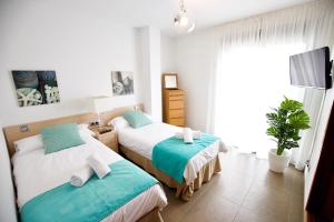 Postel nebo postele na pokoji v ubytování Apartamento Portobello