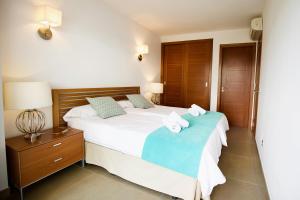 Postel nebo postele na pokoji v ubytování Apartamento Portobello