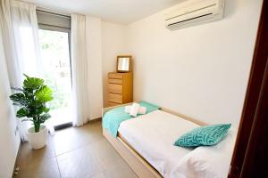 Postel nebo postele na pokoji v ubytování Apartamento Portobello