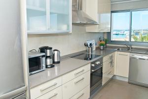 Kuchyň nebo kuchyňský kout v ubytování Apartamento Portobello