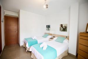 Postel nebo postele na pokoji v ubytování Apartamento Portobello