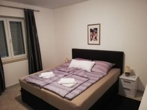 Posteľ alebo postele v izbe v ubytovaní Vivi holiday house for 4 people