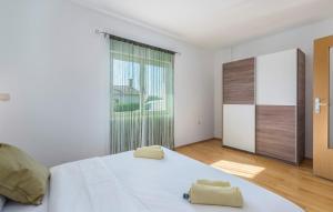 Katil atau katil-katil dalam bilik di Apartments Dobrec +16 gambar