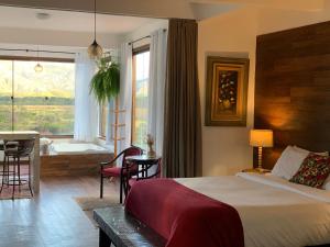 Ένα ή περισσότερα κρεβάτια σε δωμάτιο στο Pousada Belvedere da Serra