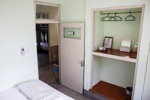 Voodi või voodid majutusasutuse Little Garden Dream Life Home toas