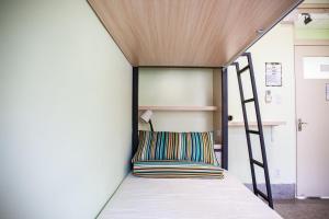 Voodi või voodid majutusasutuse Little Garden Dream Life Home toas