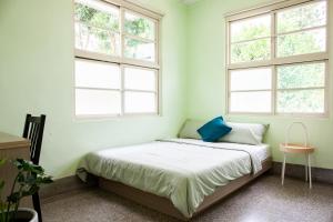 Voodi või voodid majutusasutuse Little Garden Dream Life Home toas