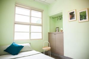 Voodi või voodid majutusasutuse Little Garden Dream Life Home toas