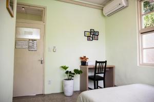 Voodi või voodid majutusasutuse Little Garden Dream Life Home toas