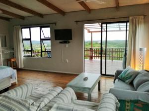 Televisyen dan/atau pusat hiburan di Dune View Cottage