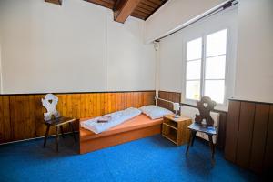 Postel nebo postele na pokoji v ubytování Penzion Na Rychtě