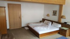 Postel nebo postele na pokoji v ubytování Gästehaus Valentina