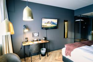 Postel nebo postele na pokoji v ubytování Canyon Hotell