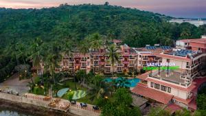 an aerial view of a resort with a pool at Lazy Lagoon, Baga A Lemon Tree Resort, Goa in Baga