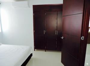 Ein Bett oder Betten in einem Zimmer der Unterkunft Cristoforo Oasis