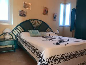 En eller flere senge i et værelse på Lilla apartment