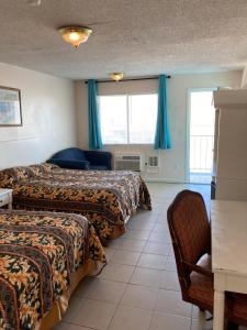 Postel nebo postele na pokoji v ubytování Surfside Motel - Seaside Heights + 37 fotografií