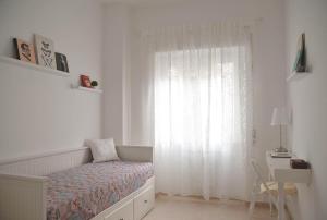 Posteľ alebo postele v izbe v ubytovaní Feeling Home