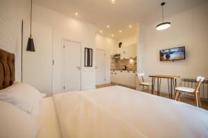 Katil atau katil-katil dalam bilik di Idea Design Apart-Hotel Chykalenka