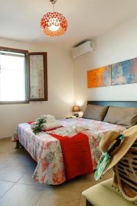 Postel nebo postele na pokoji v ubytování Dimora del Sole