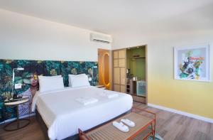 Postel nebo postele na pokoji v ubytování Mercure Rio Boutique Hotel Copacabana