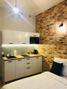Kuchyňa alebo kuchynka v ubytovaní Property Apart - Ruska Centrum