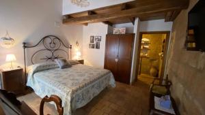 a bedroom with a bed in a room at Il Vento e la Ginestra in Bagnoregio +85 photos