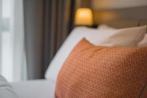 A bed or beds in a room at Dovv Hotel Busıness