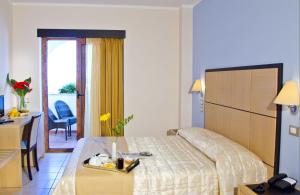 Katil atau katil-katil dalam bilik di Forte Hotel