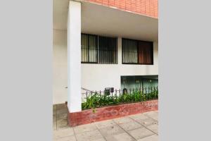 Budova, kde se apartmán nachází + 5 fotografií