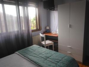 A bed or beds in a room at Hotel Solpor