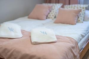 Łóżko lub łóżka w pokoju w obiekcie Villa Rafałko